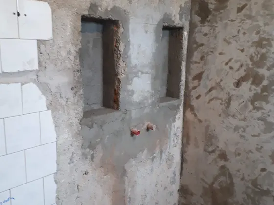 Stavební úpravy a nové konstrukce při změně dispozice koupelny.